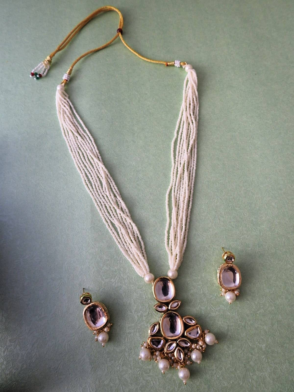 Aavya Layered Kundan Necklace Set with Pearl Drops