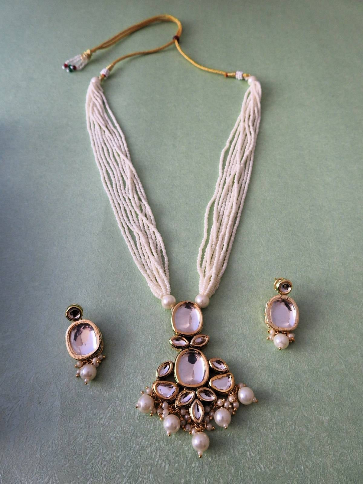 Aavya Layered Kundan Necklace Set with Pearl Drops