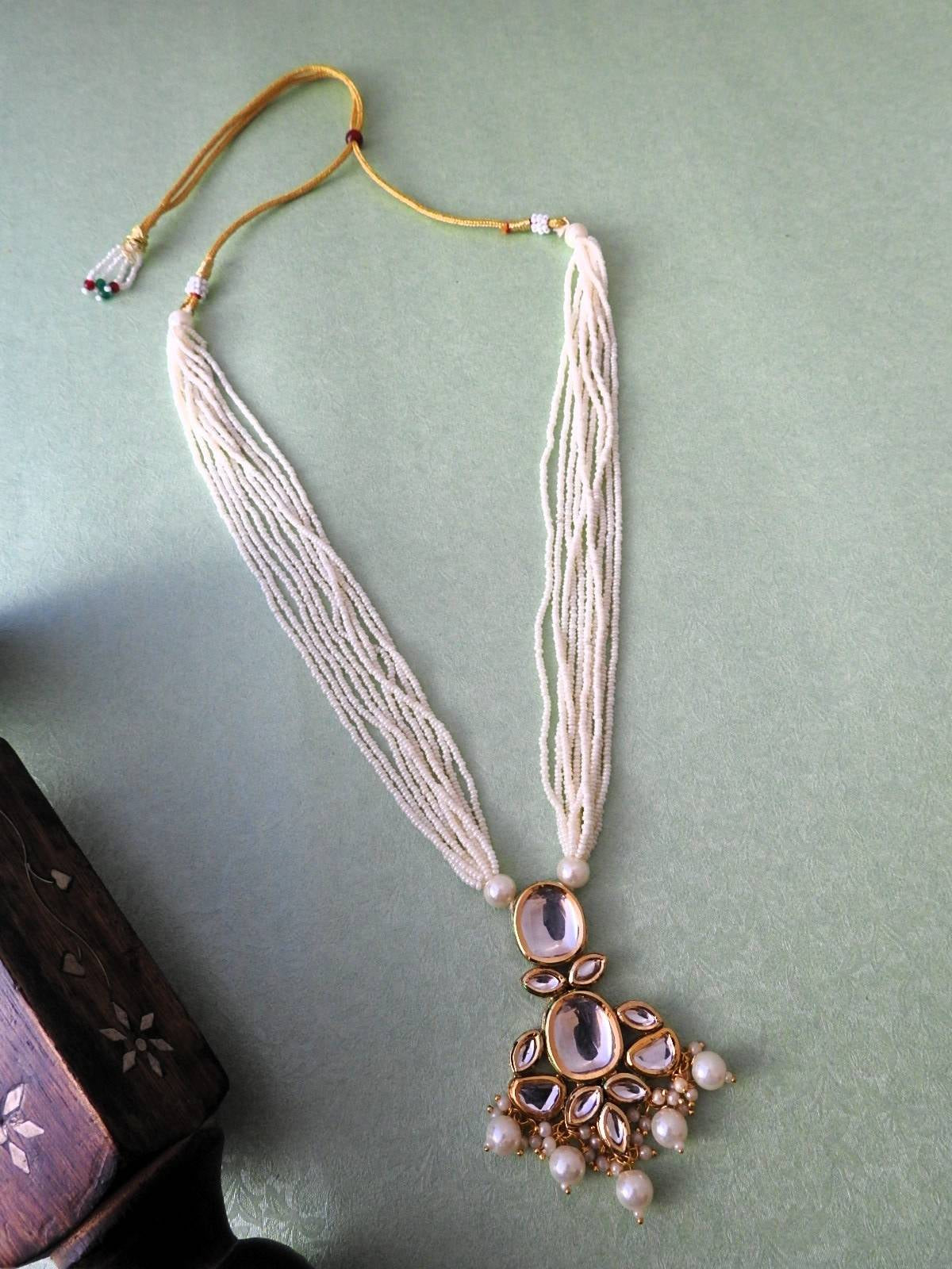 Aavya Layered Kundan Necklace Set with Pearl Drops